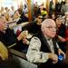 Bill Meggison, of Ypislanti, listens as Republican presidential candidate Herman Cain speaks to a crowd at the Big Sky Diner in Ypsilanti during a stop on Thursday morning. Melanie Maxwell I AnnArbor.com
